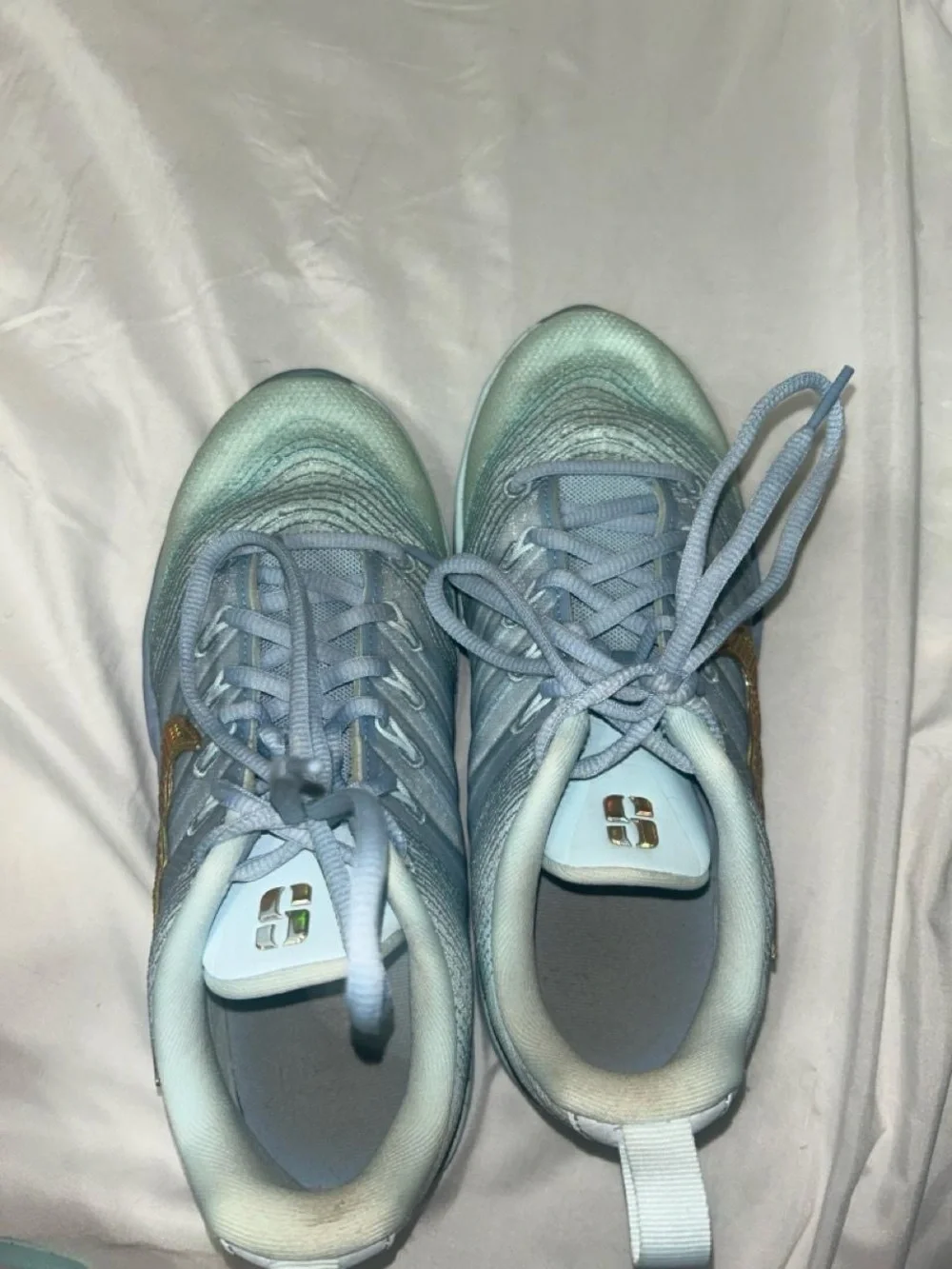 Nike Women's Light Blue Sneakers with Iridescent Gold Swoosh